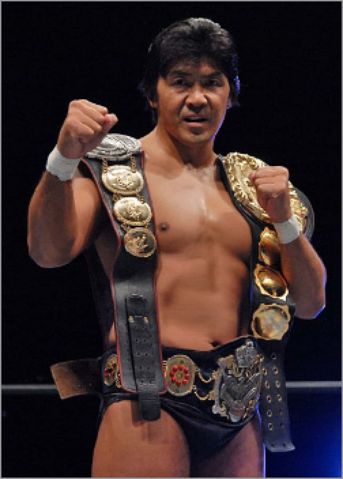 Japanese Mixed Martial Artist Masakatsu Funaki With Champion Belts Background