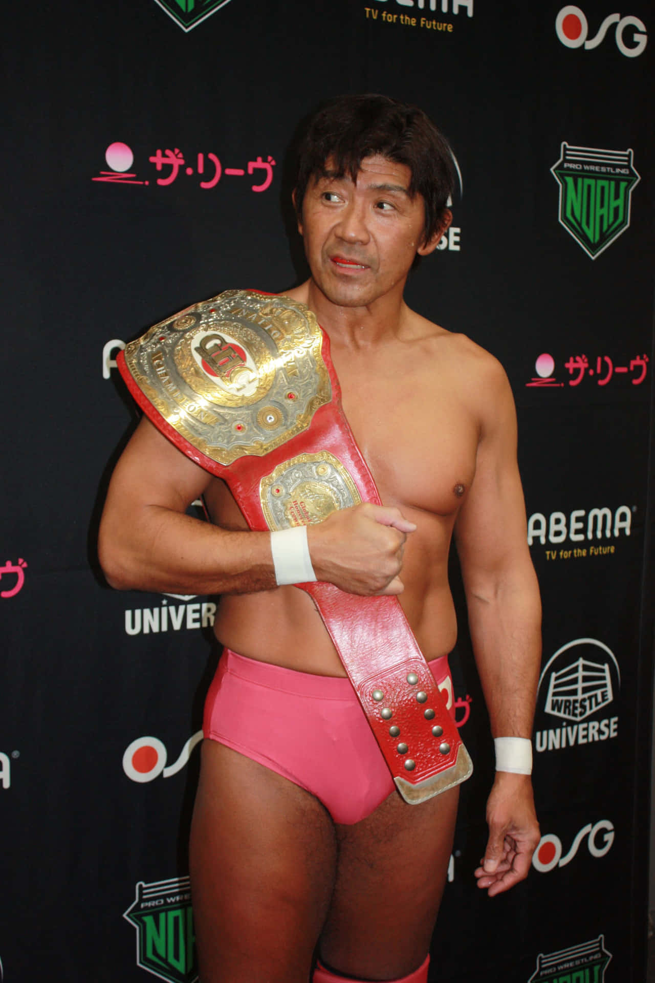 Japanese Mixed Martial Arts Legend, Masakatsu Funaki, Holding Ghc National Champion Belt Background