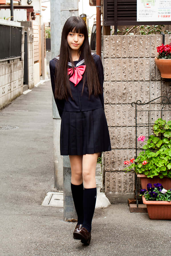 Japanese School Girl In Alley Background