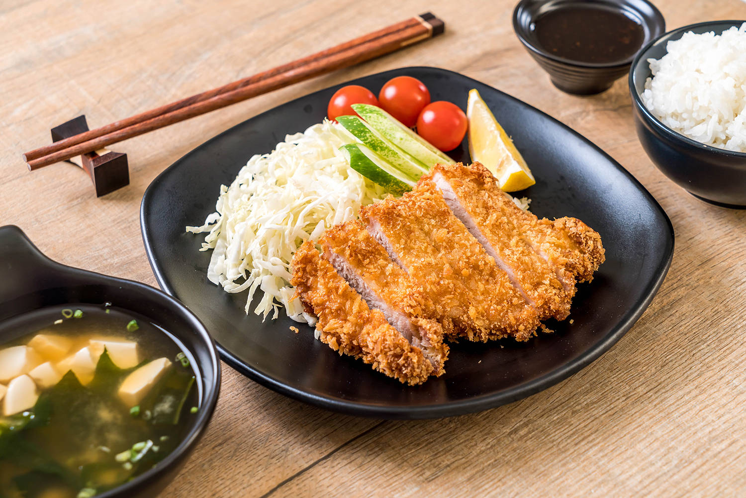 Japanese Tonkatsu Served With Other Dishes Background