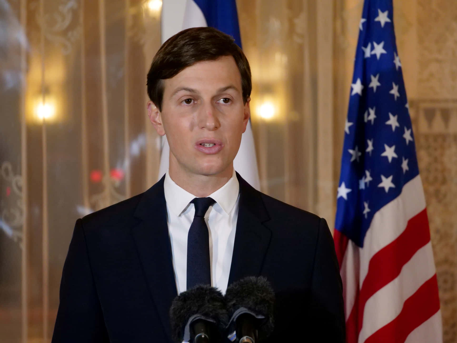 Jared Kushner Delivering Speech Background
