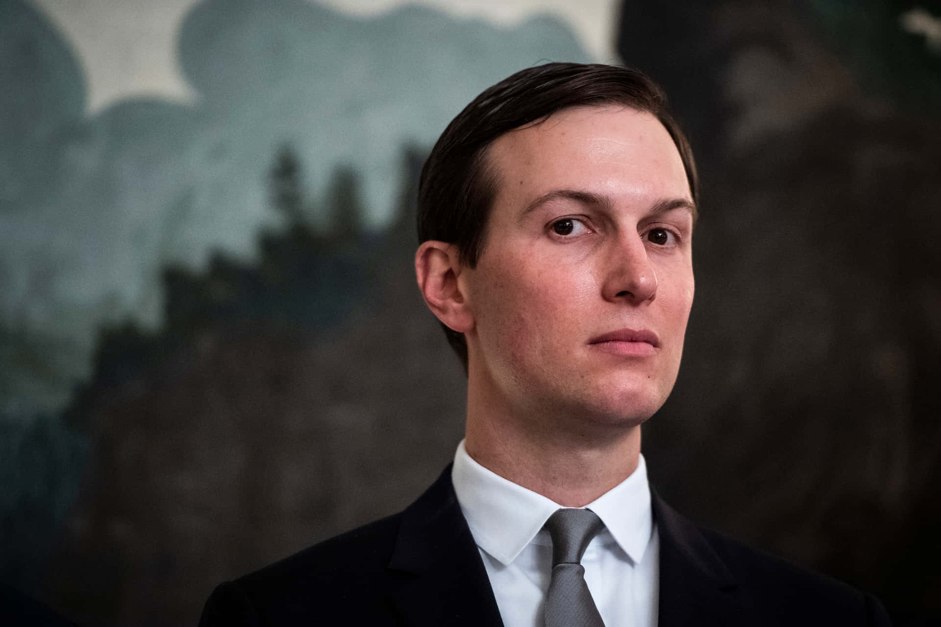 Jared Kushner Engaged In A High-level Business Meeting. Background