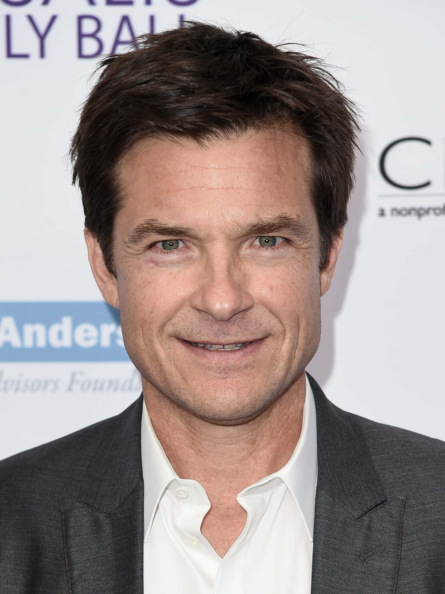 Jason Bateman - A Portrait Of Calm Sophistication Background
