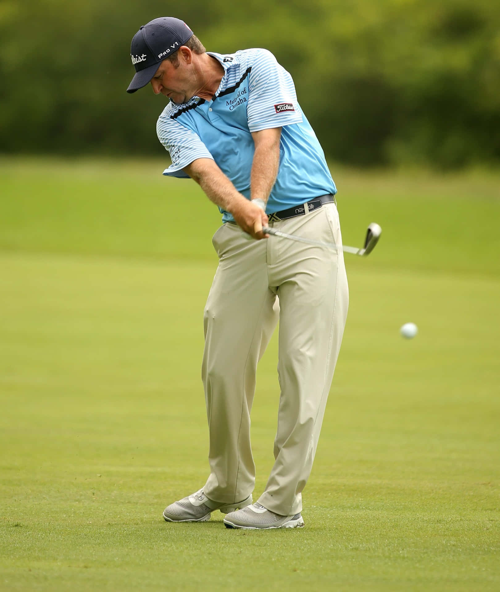 Jason Bohn Showcasing Perfect Golf Swing Posture Background