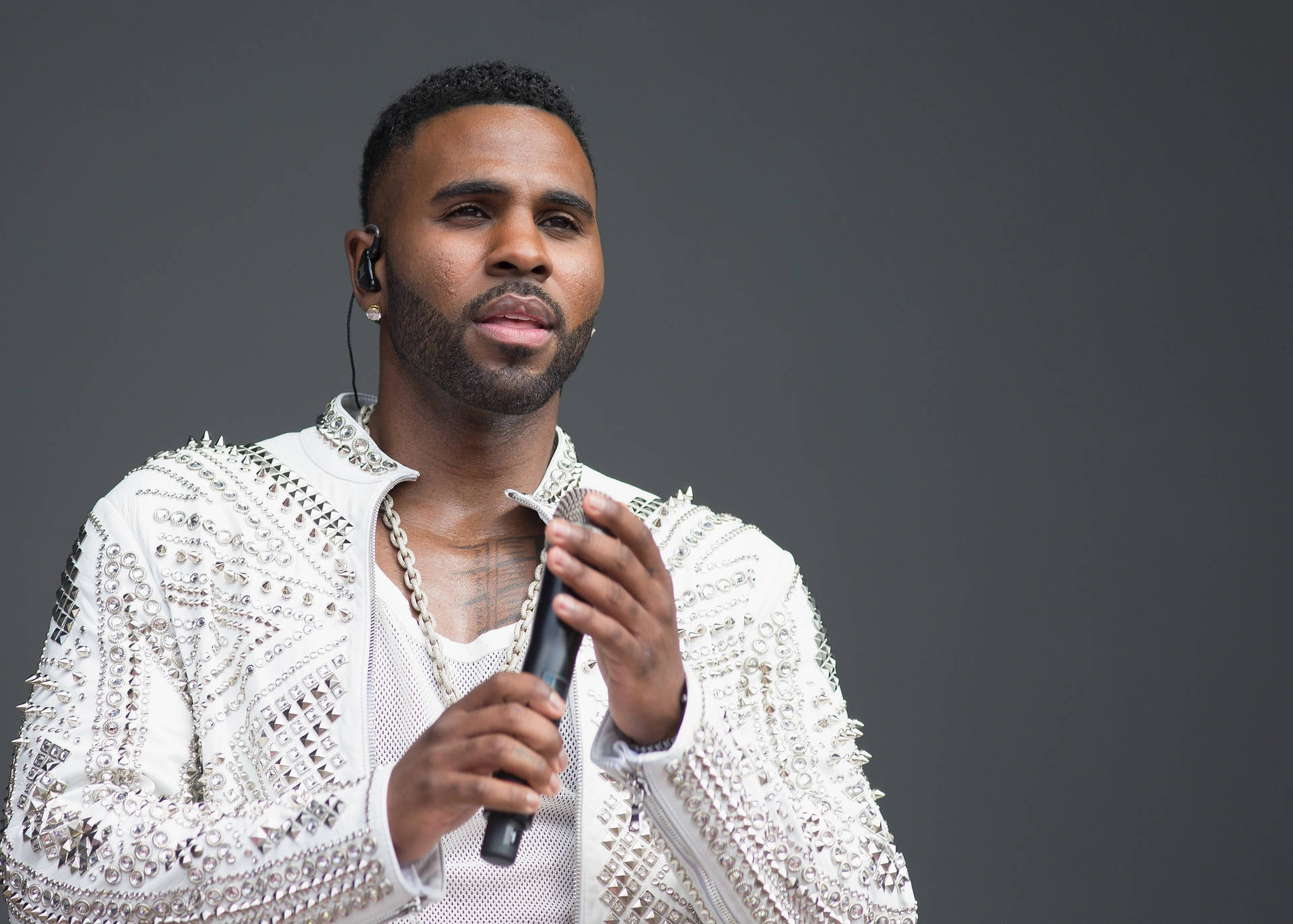 Jason Derulo Looking Dapper In An Embellished Outfit Background