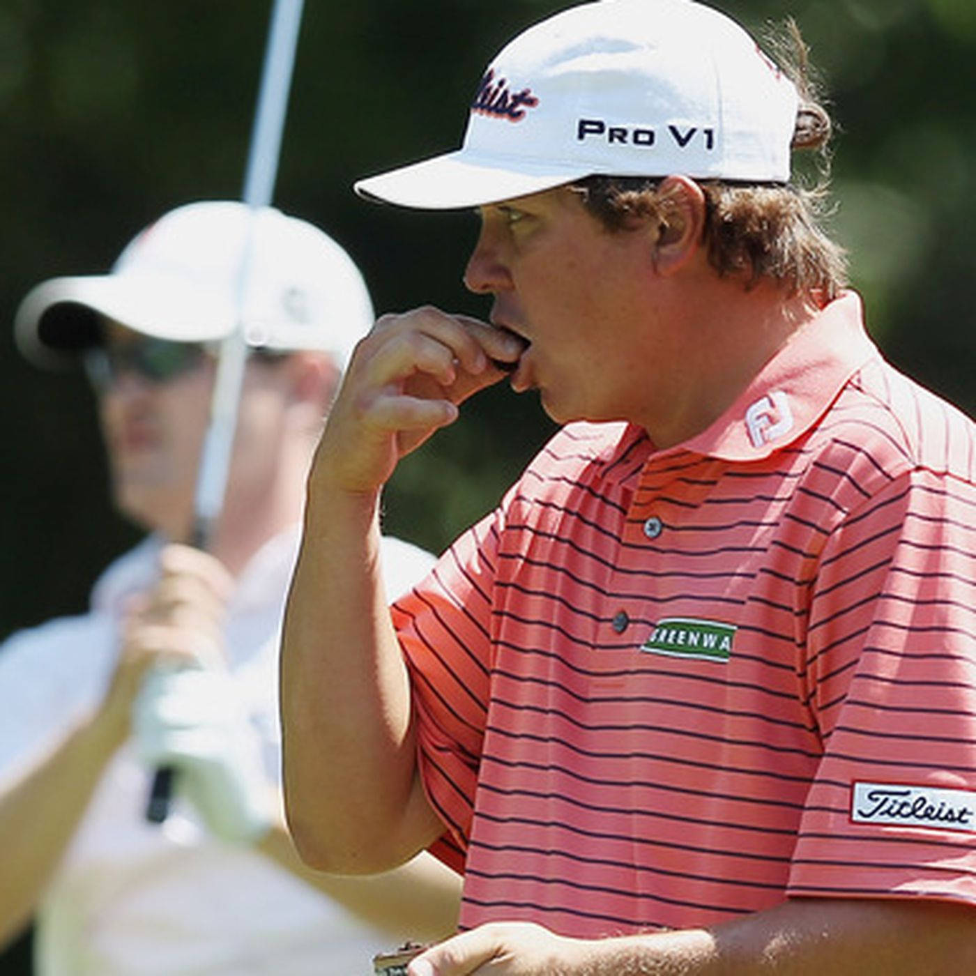 Jason Dufner Eating During A Game Background