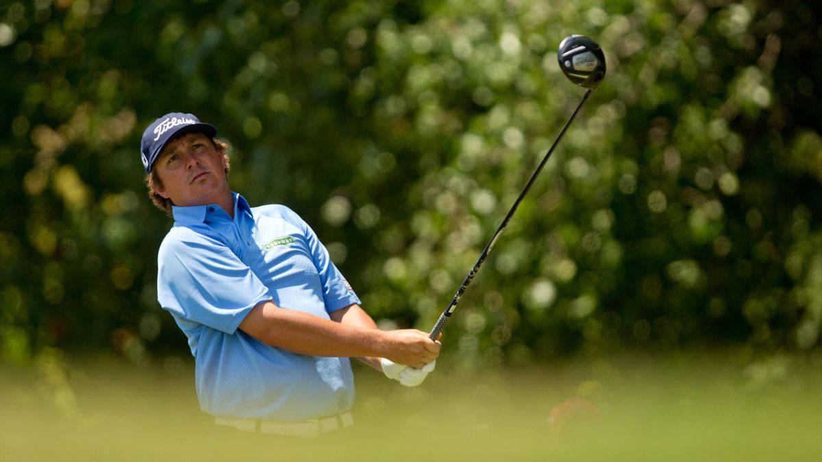 Jason Dufner Gazing At Golf Ball Background