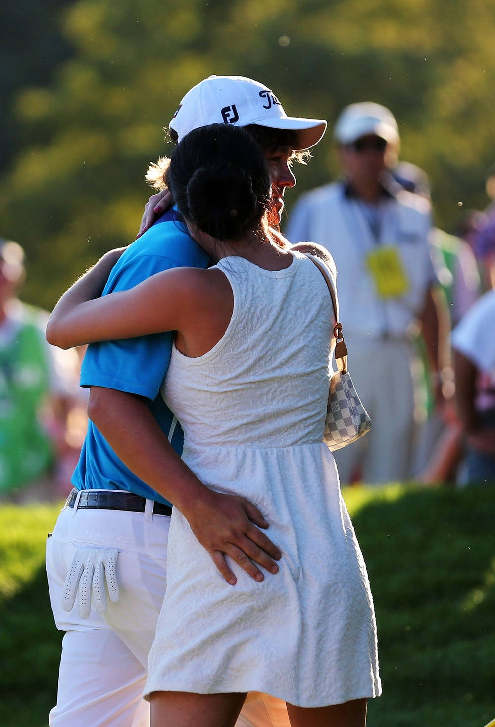 Jason Dufner Hugging His Wife Background