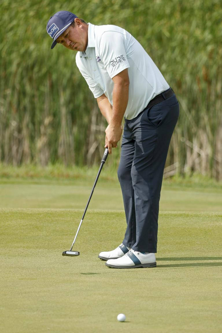 Jason Dufner Swinging A Club Background