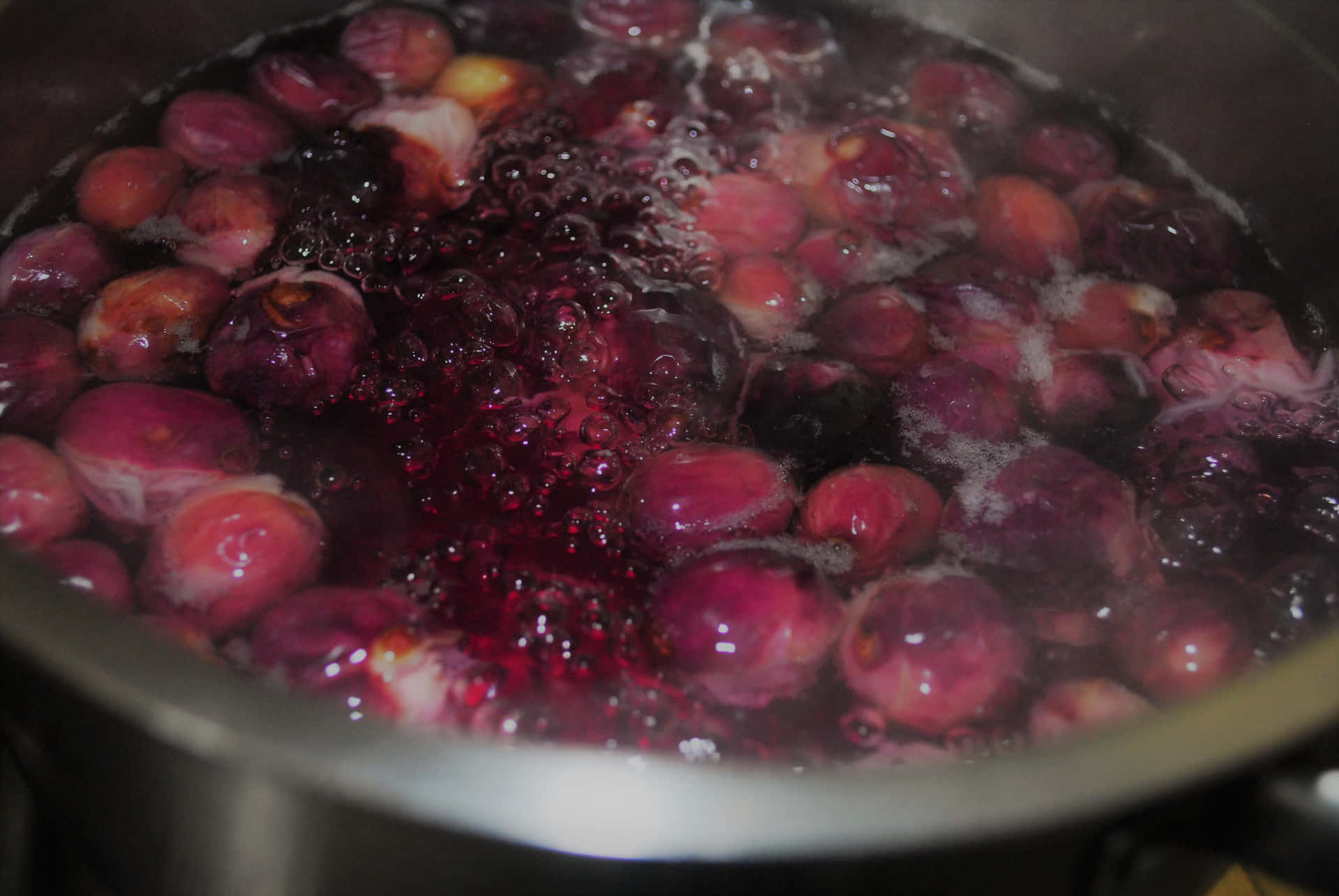 Java Plums In A Large Stainless Steel Pot Background