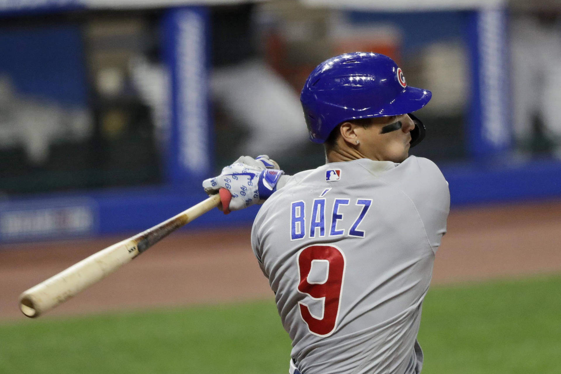 Javier Baez Baseball Bat On Field Background