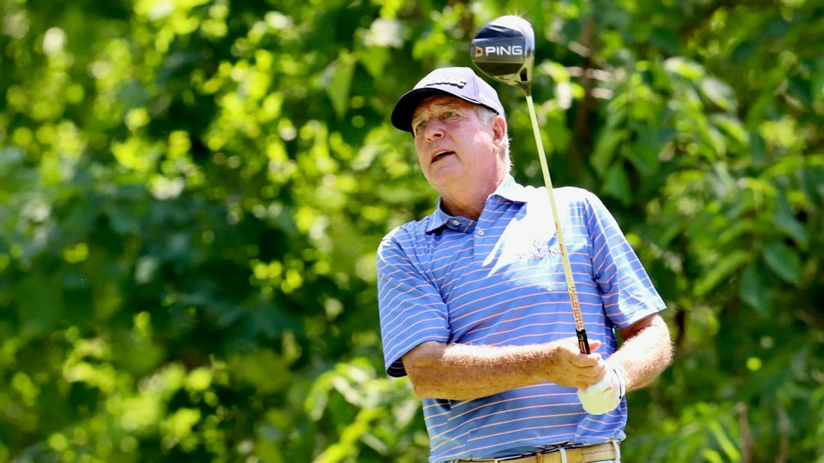 Jay Haas Holding Golf Club Up Background