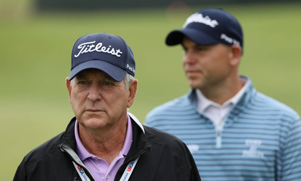 Jay Haas Sporting A Titleist Golf Cap On The Course Background