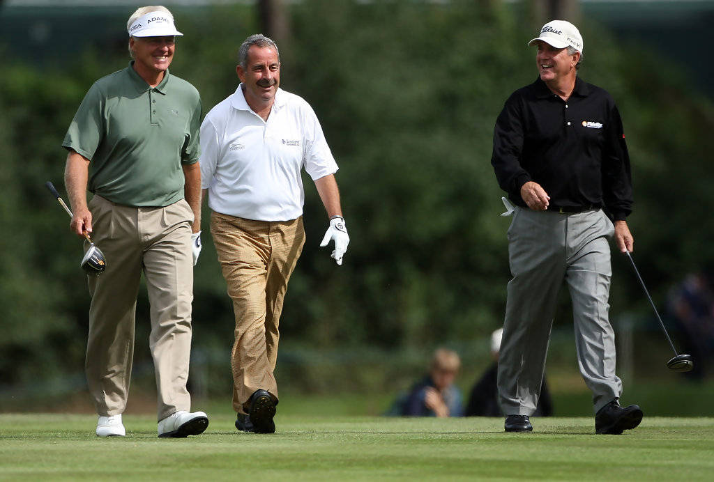 Jay Haas Walking With Senior Golfers Background