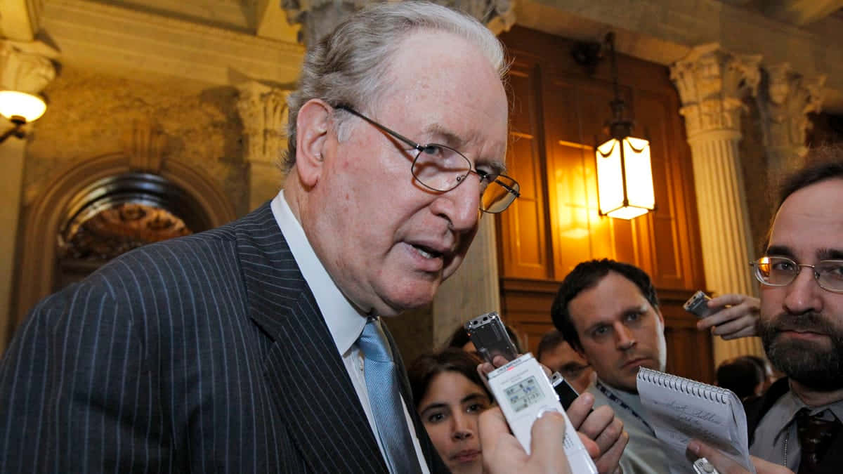 Jay Rockefeller Speaking Into Recording Devices Background