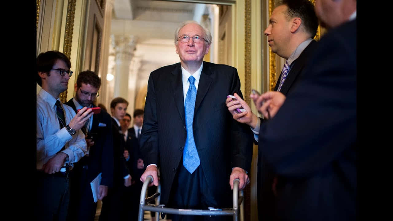 Jay Rockefeller Using Walker Background