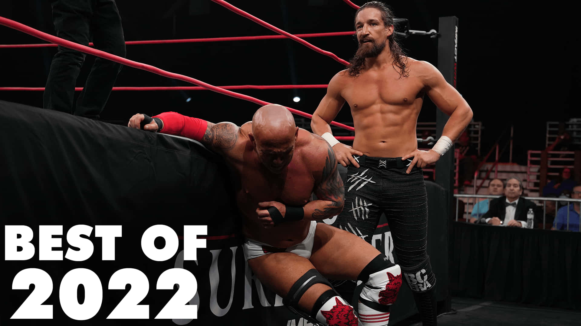 Jay White Looking Down On Eric Young Background