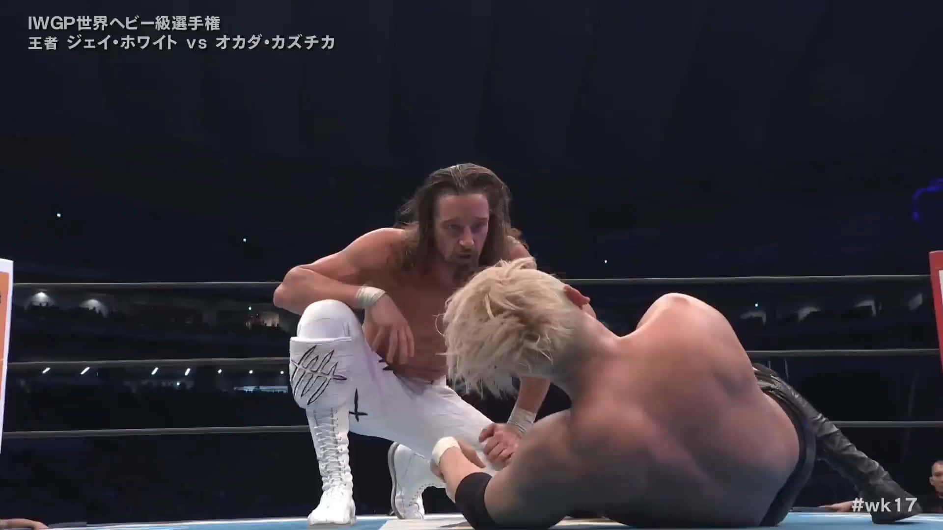 Jay White Talking To Kazuchika Okada Background