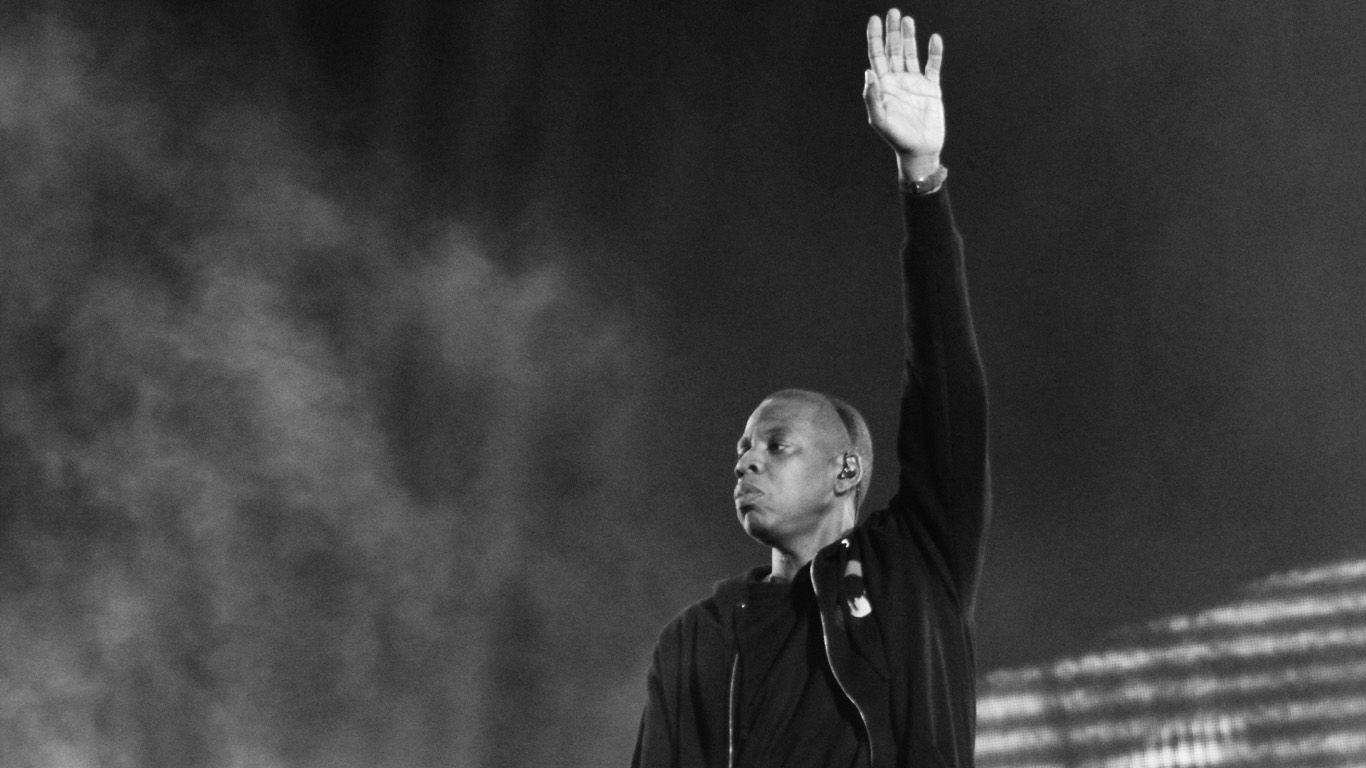 Jay-z Raising Hand Background