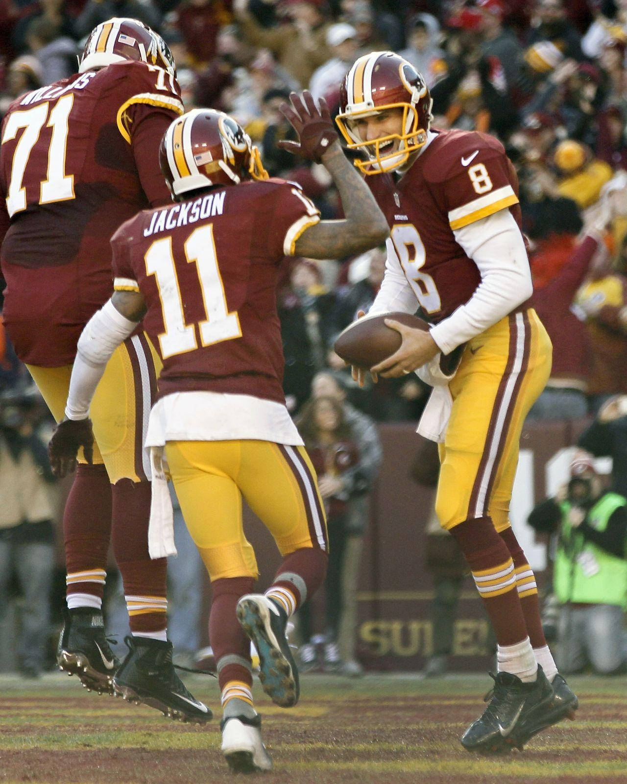 Jaymar Johnson Christian Darrisaw Kirk Cousins Celebrating Background