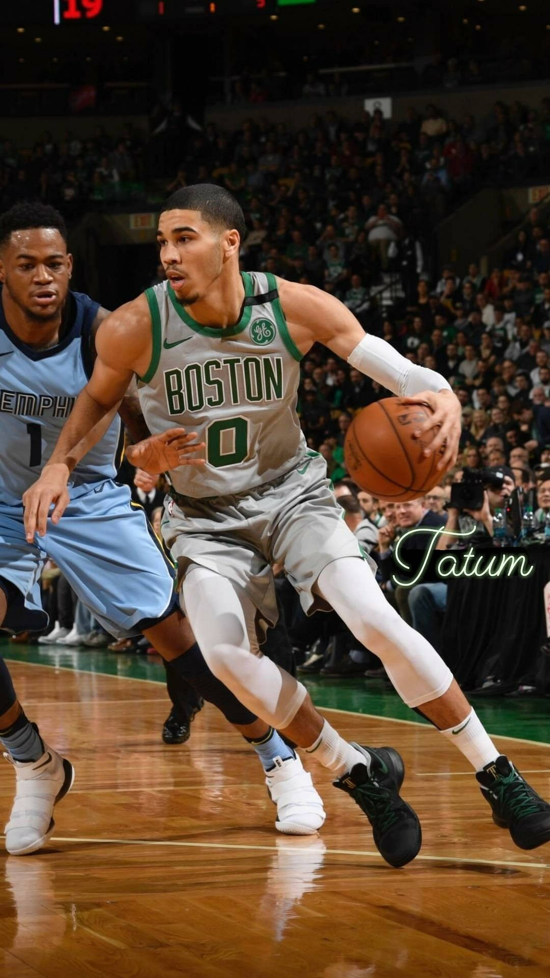 Jayson Tatum In Action: An Epitome Of Athletic Excellence Background