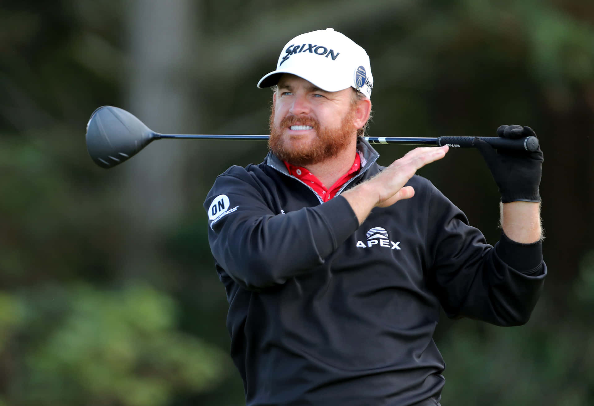 Jb Holmes In Black Golf Gear Background