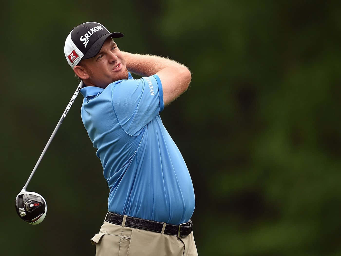 Jb Holmes Powerful Golf Strike Background