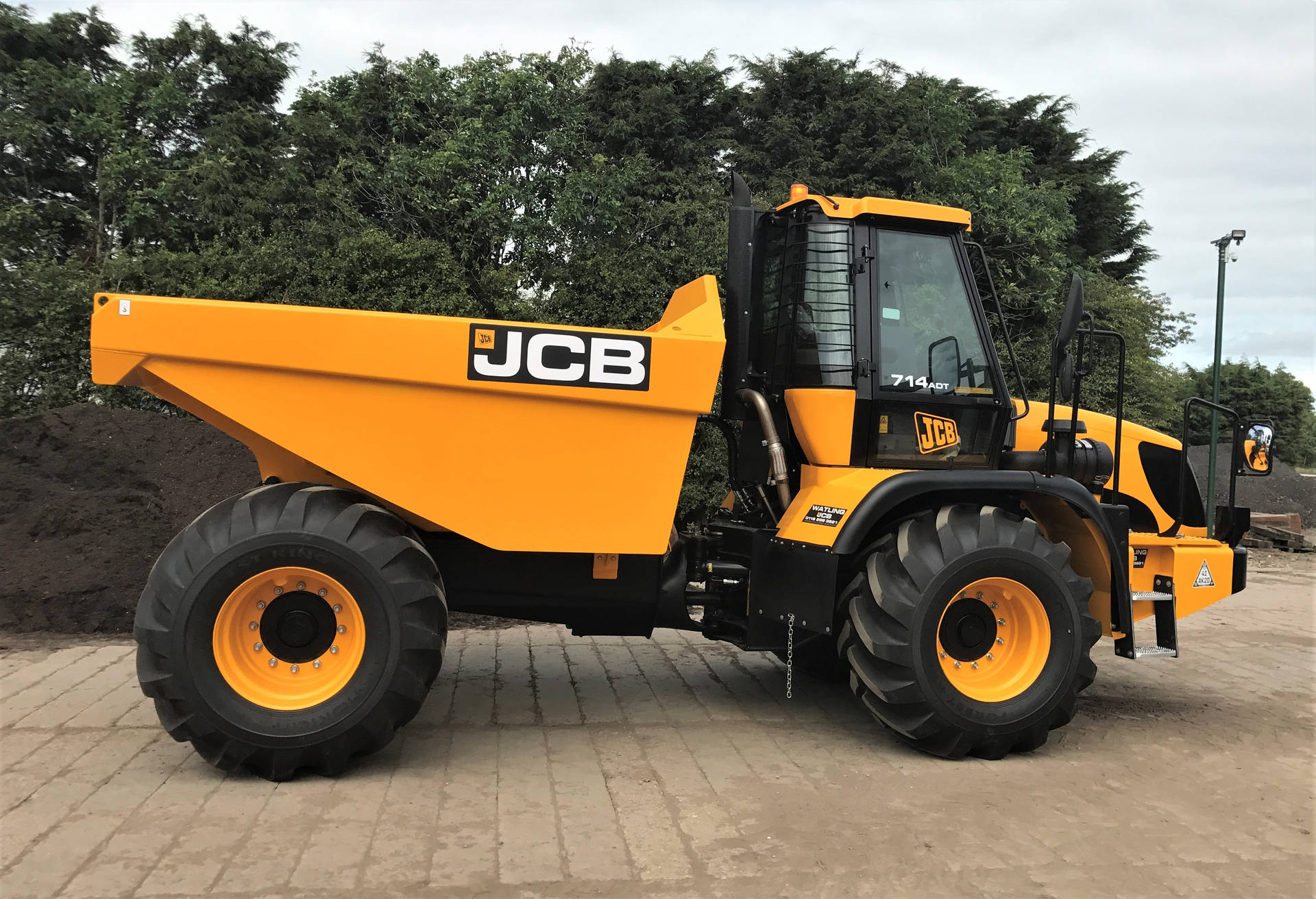 Jcb Cool Truck In Bright Yellow Color Background