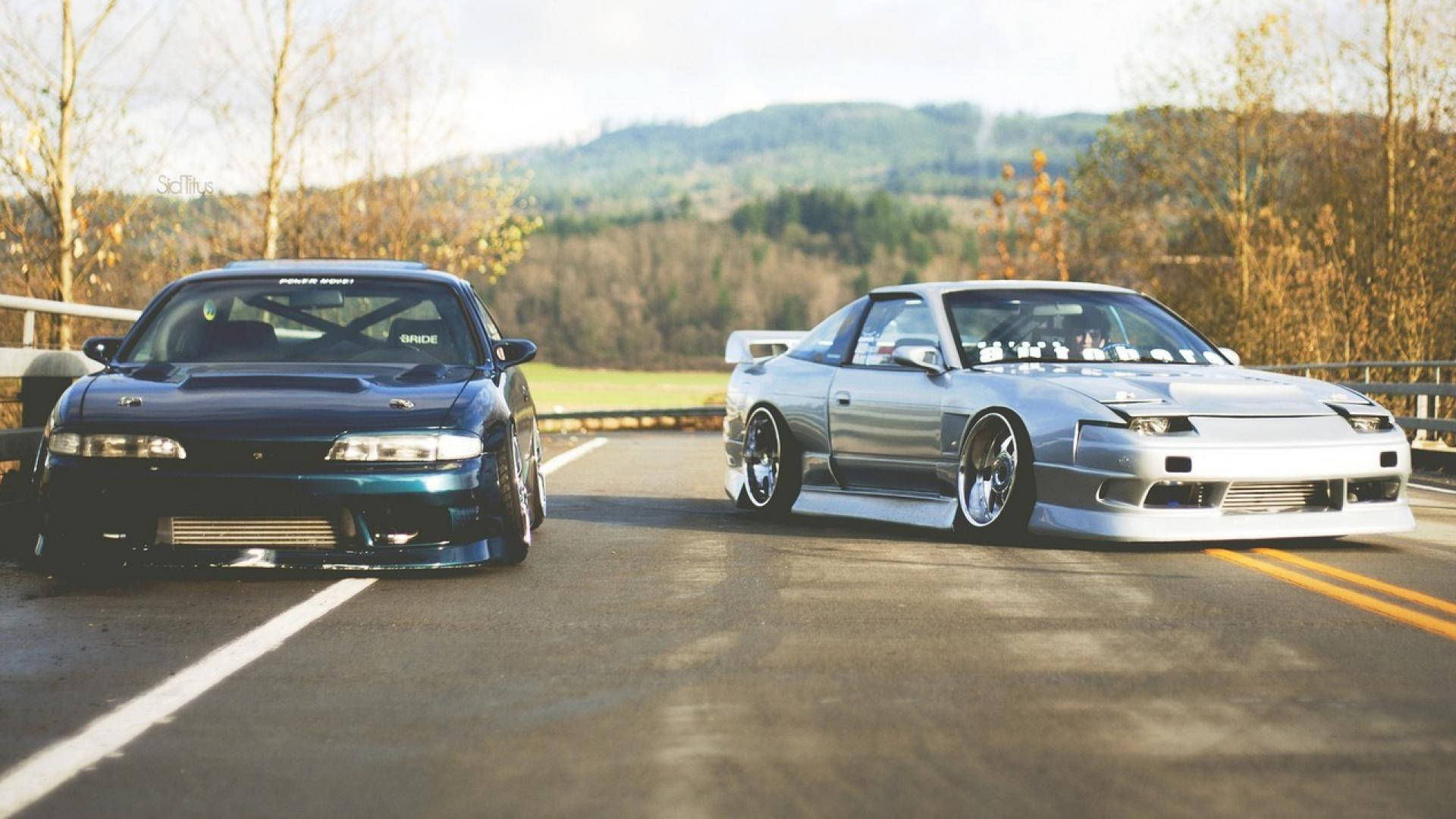 Jdm Cars Parked On Road Background