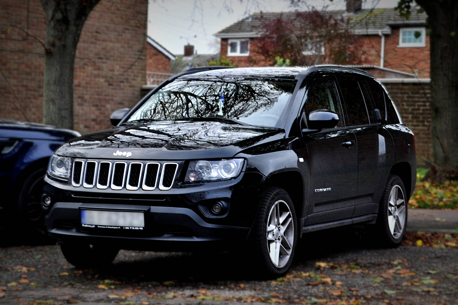 Jeep Compass Black Aesthetic With Leaves Under Background