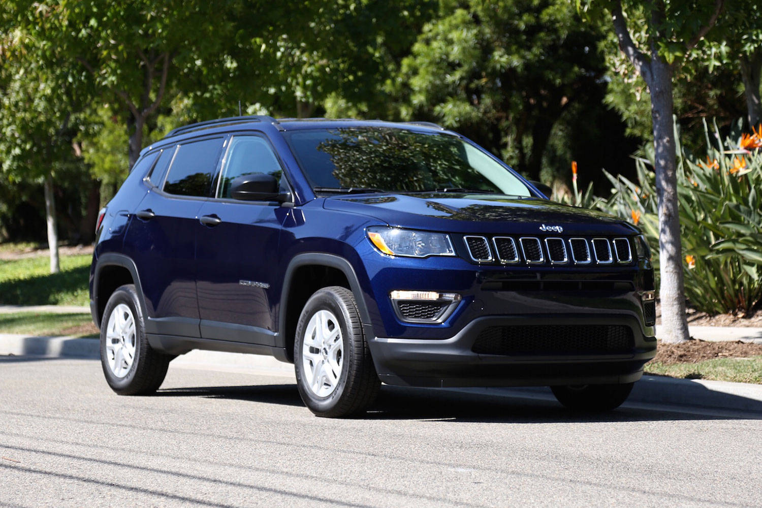 Jeep Compass Dark Blue On Road Background