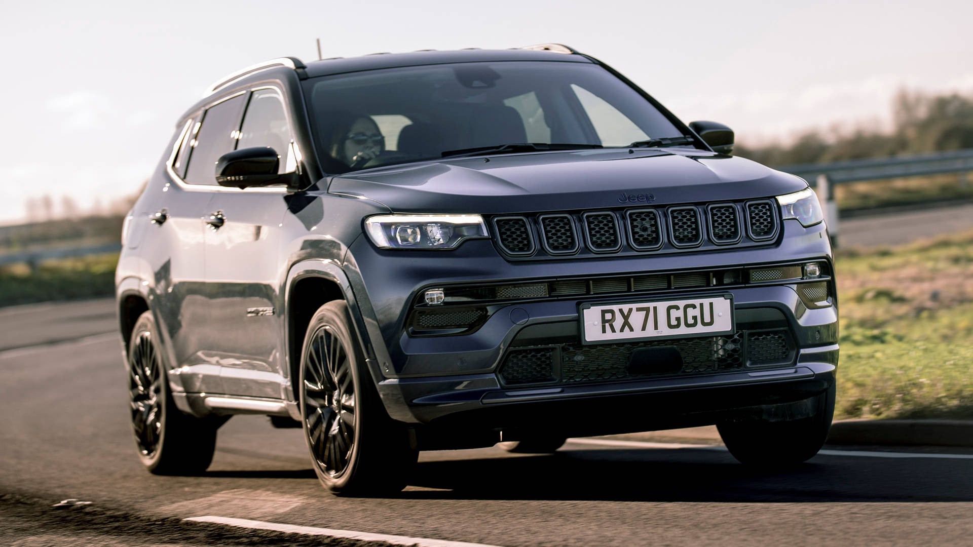 Jeep Compass On Curved Road Background