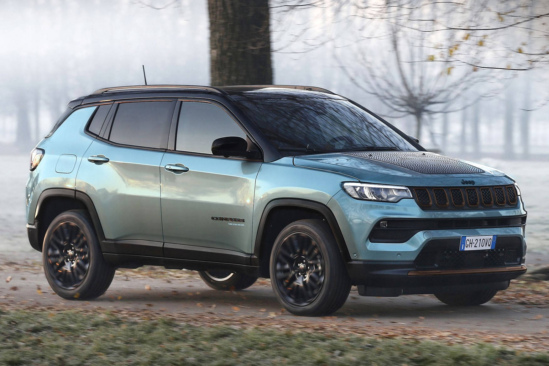 Jeep Compass With Snowy Forest Background