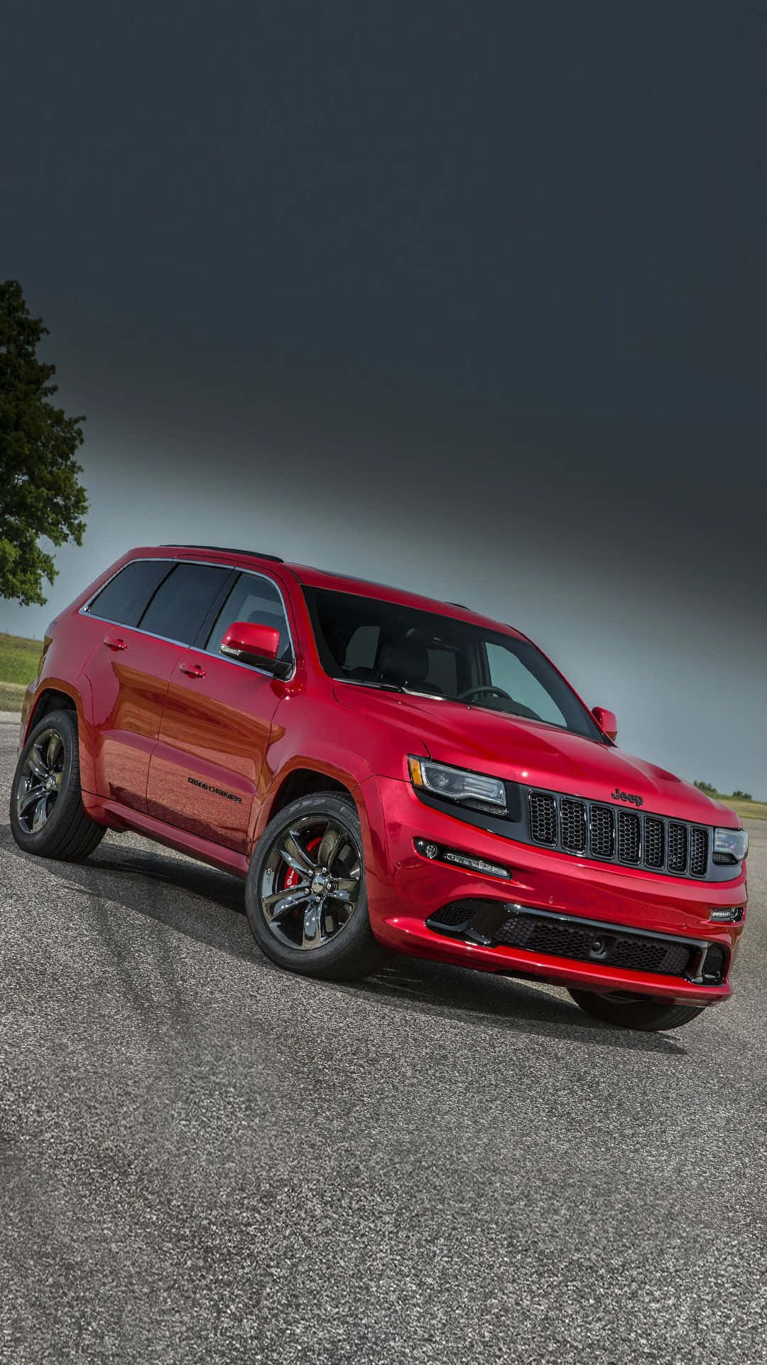 Jeep Trackhawk Under Dark Sky Background