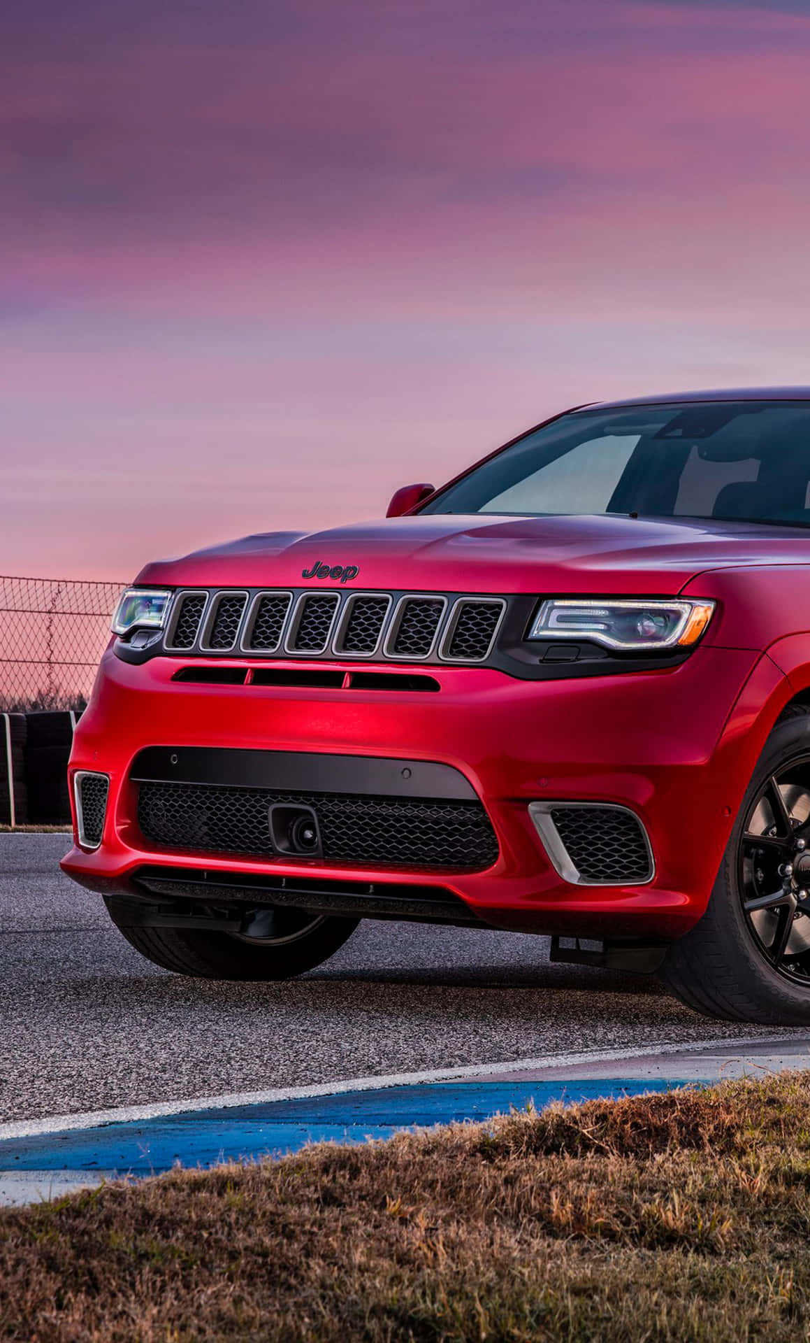 Jeep Trackhawk Under Pink Sky Background