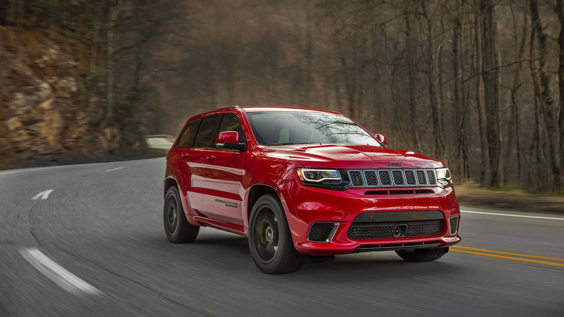 Jeep Trackhawk With Trees Background