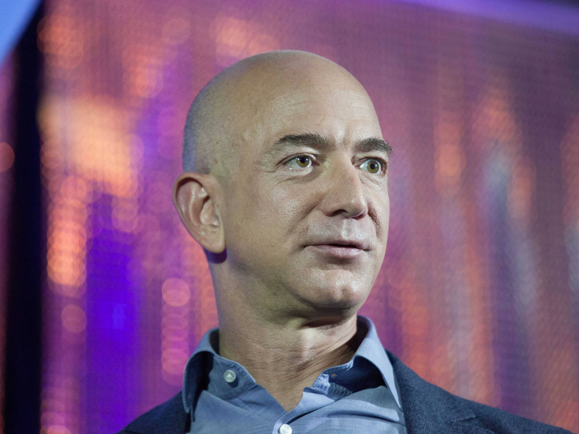 Jeff Bezos Against Sparkly Background