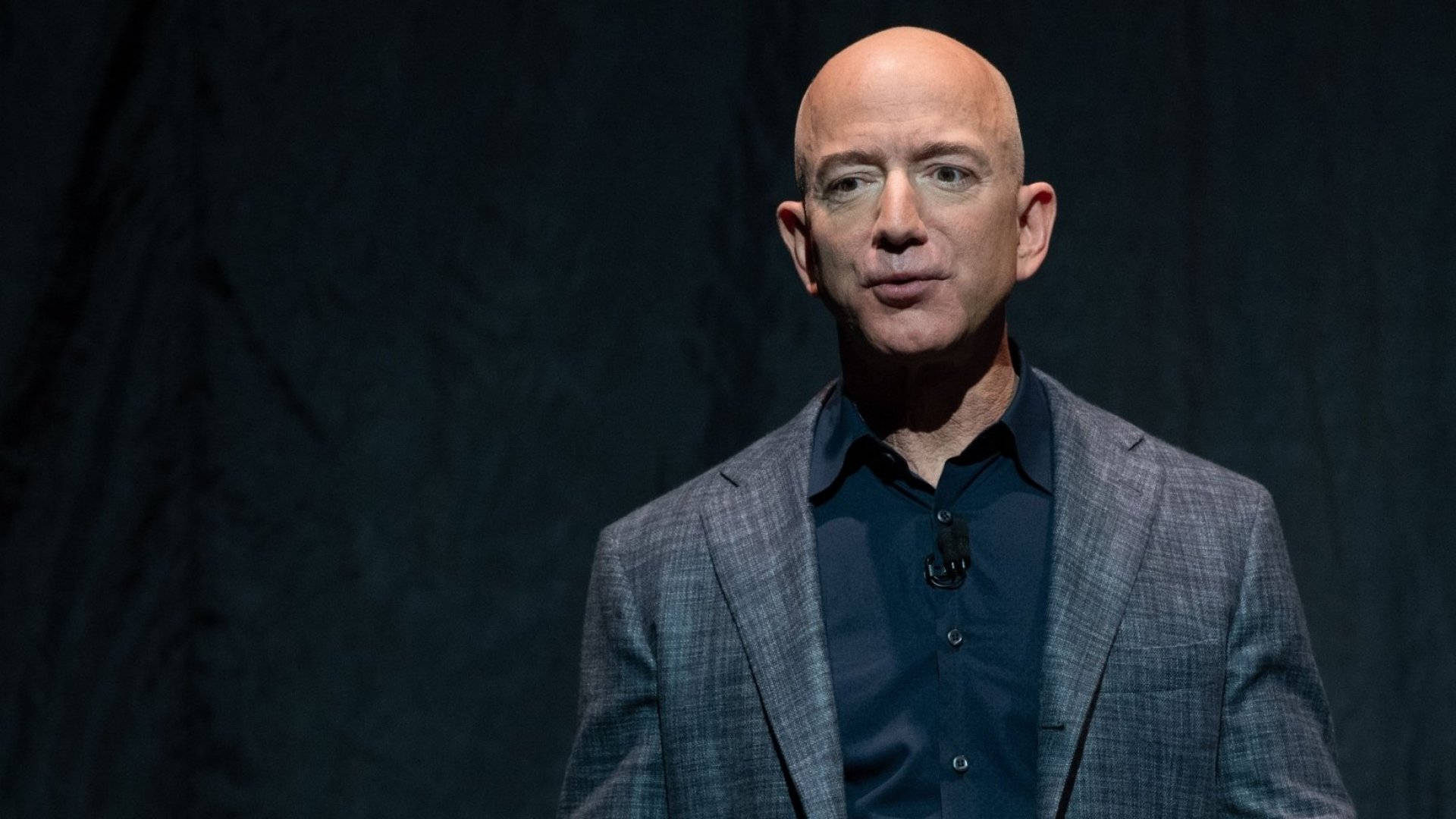 Jeff Bezos In Plain Black Background