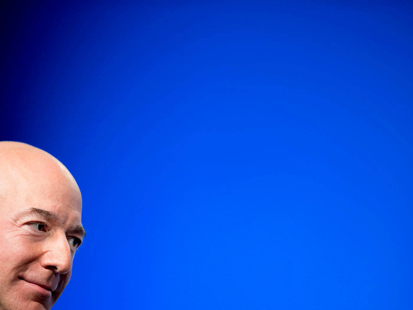 Jeff Bezos On Blue Backdrop Background