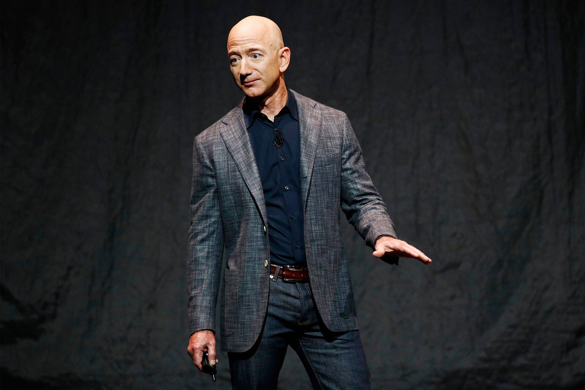 Jeff Bezos On Dark Backdrop Background