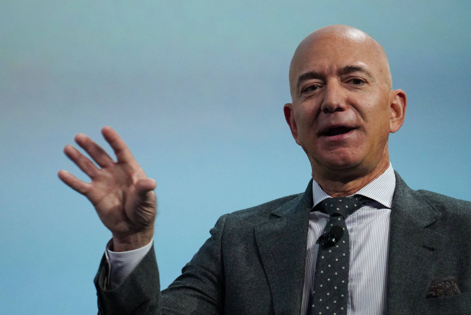 Jeff Bezos Raising His Right Hand