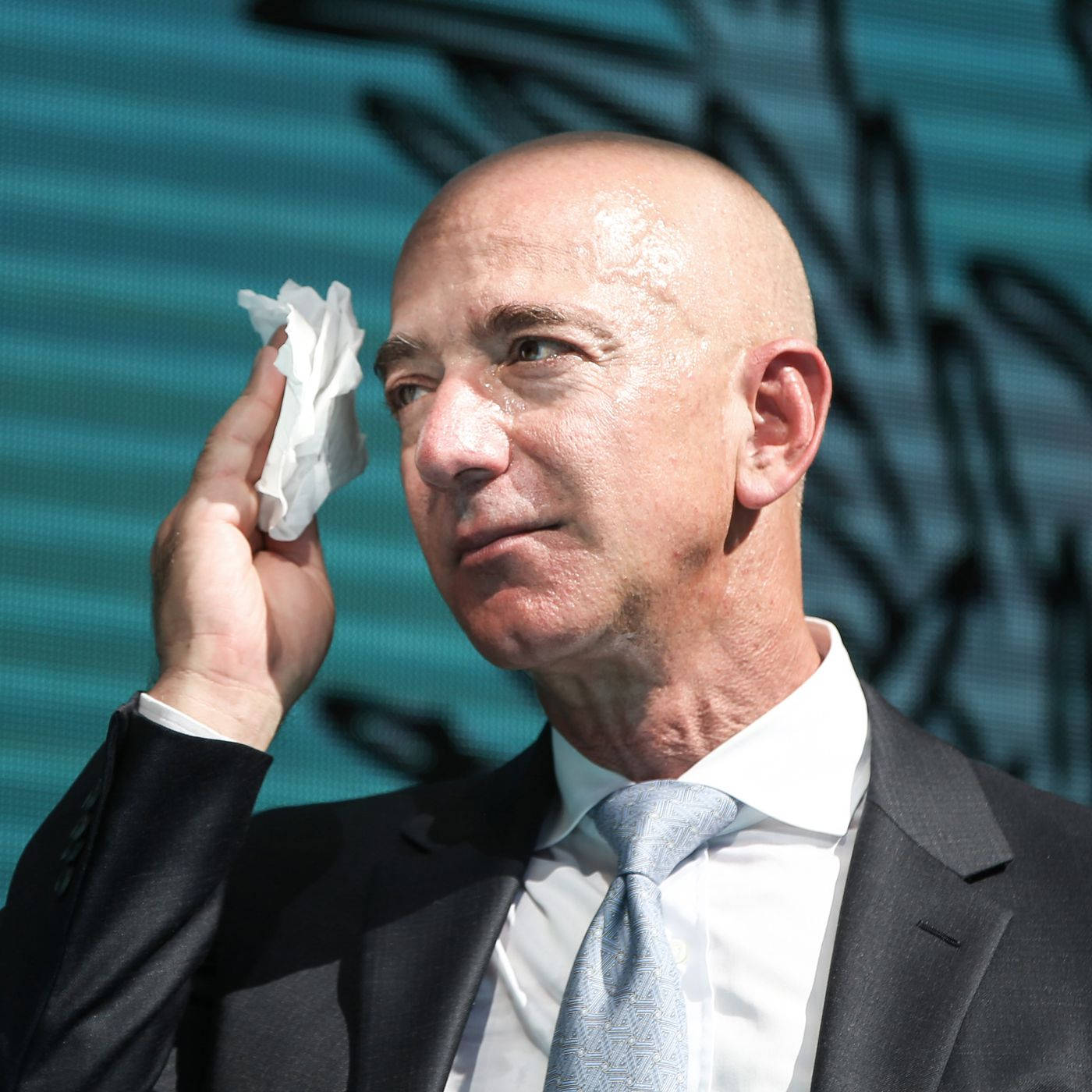 Jeff Bezos Wiping Sweat Background