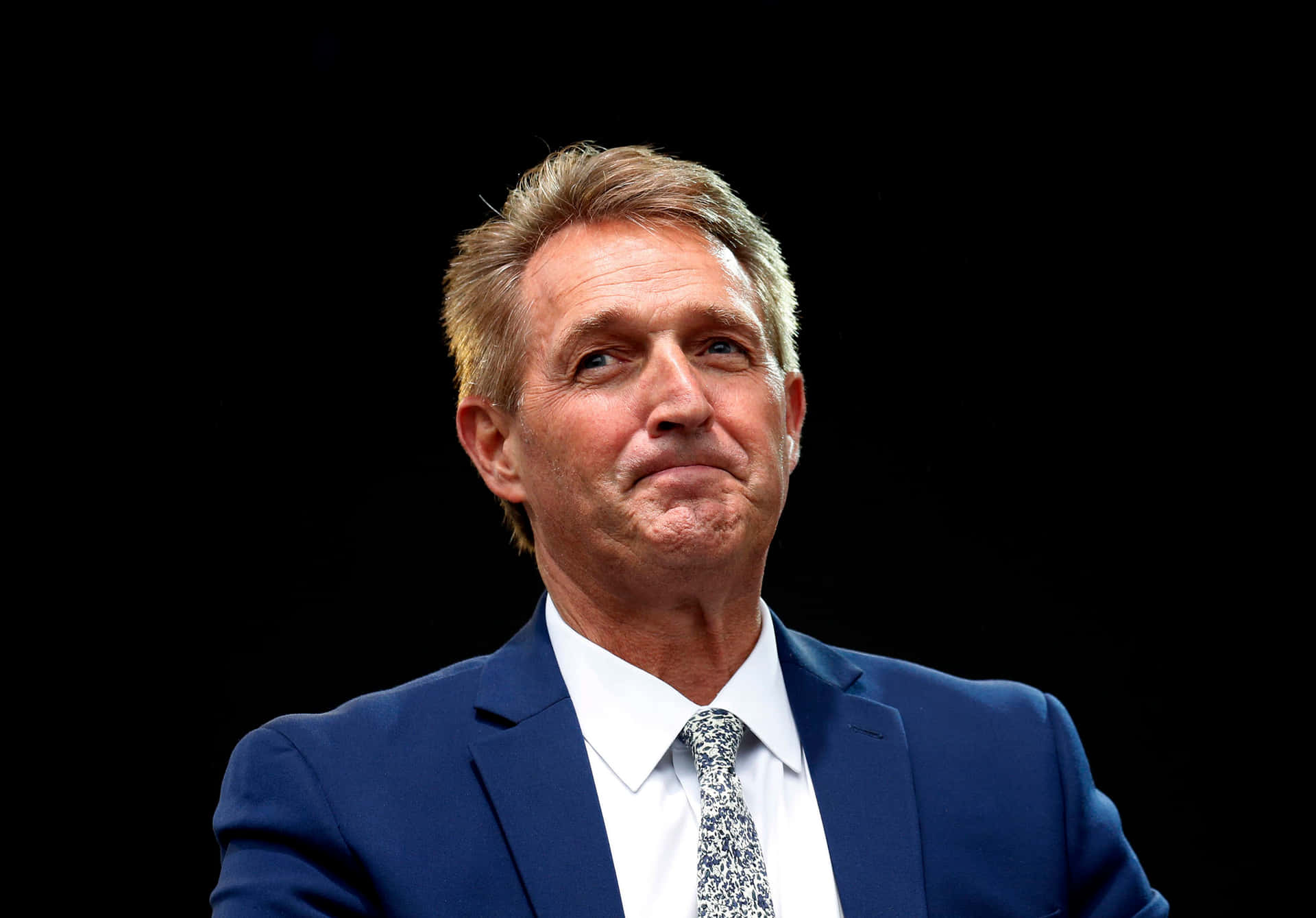 Jeff Flake On Dark Background