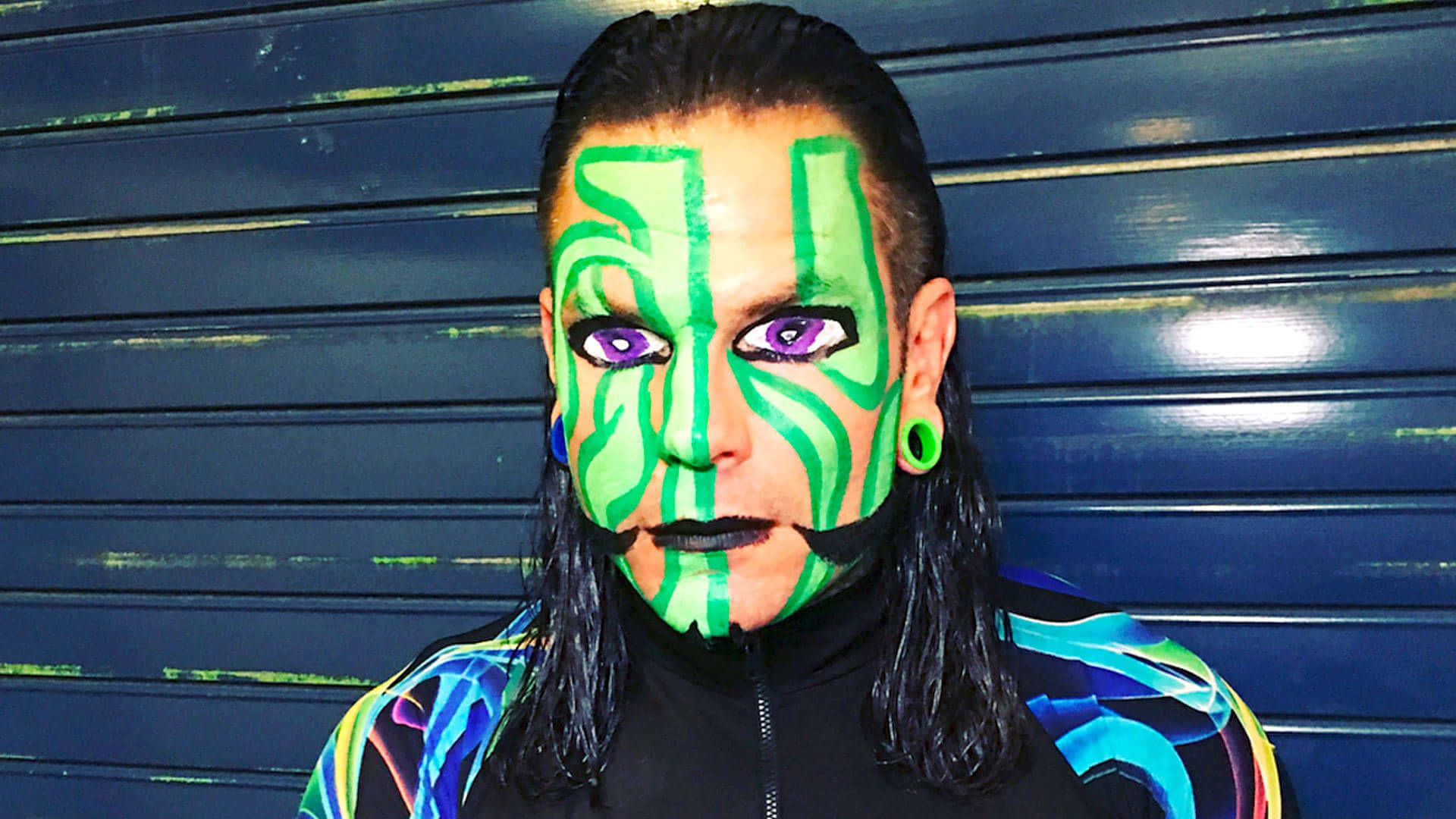 Jeff Hardy With Face Paint In Green Background
