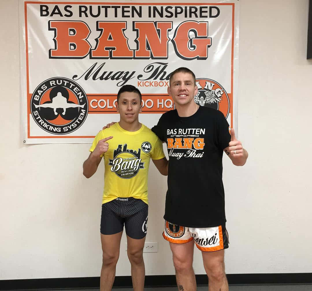 Jeff Molina Training With His Fellow Mma Fighter Background