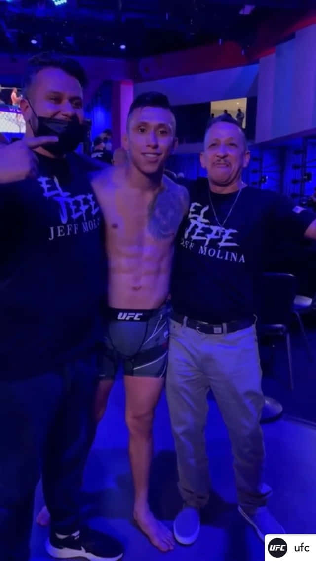 Jeff Molina With Two Men Background