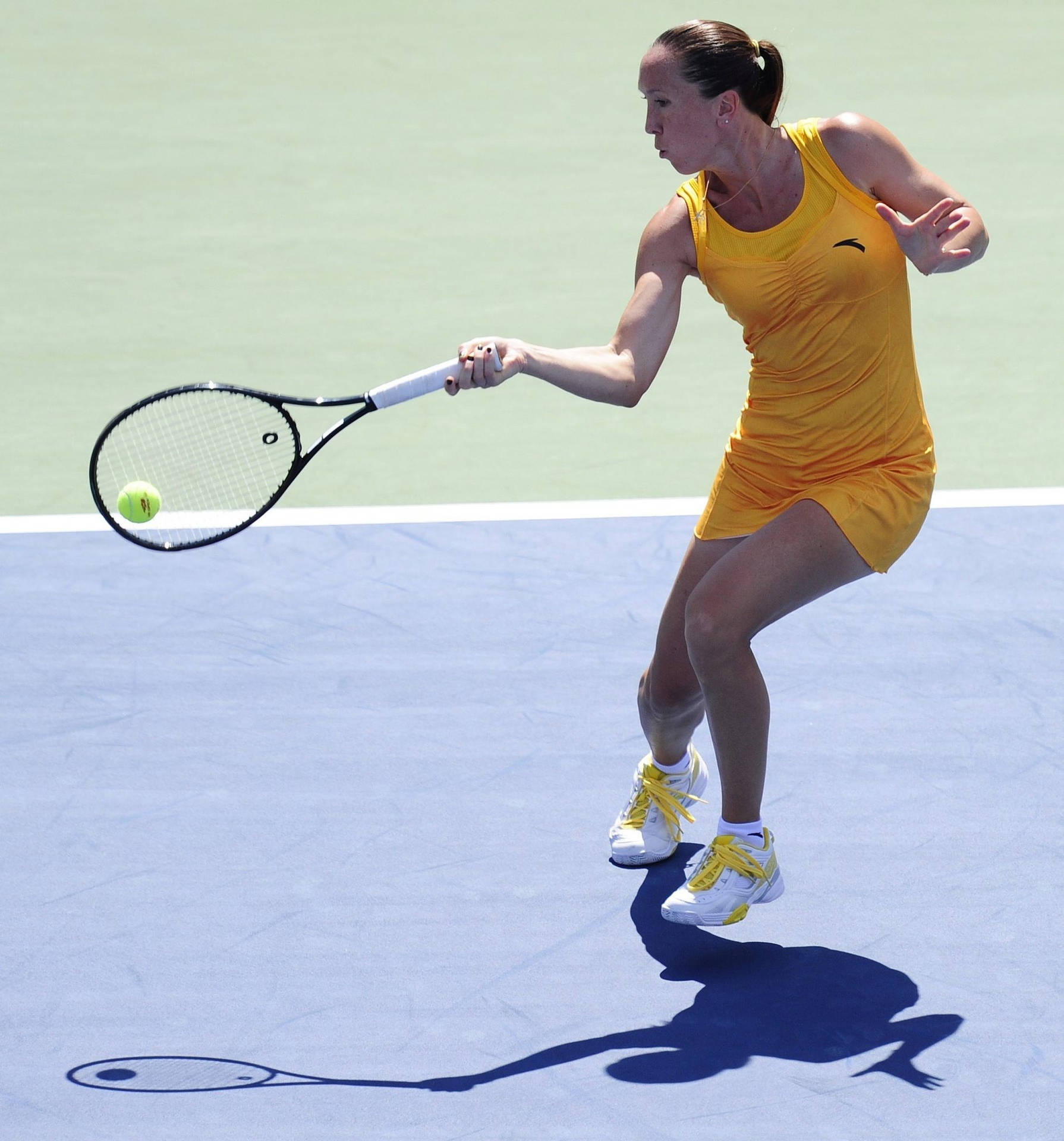 Jelena Jankovic Gracefully Executing A Forehand Stroke On Court