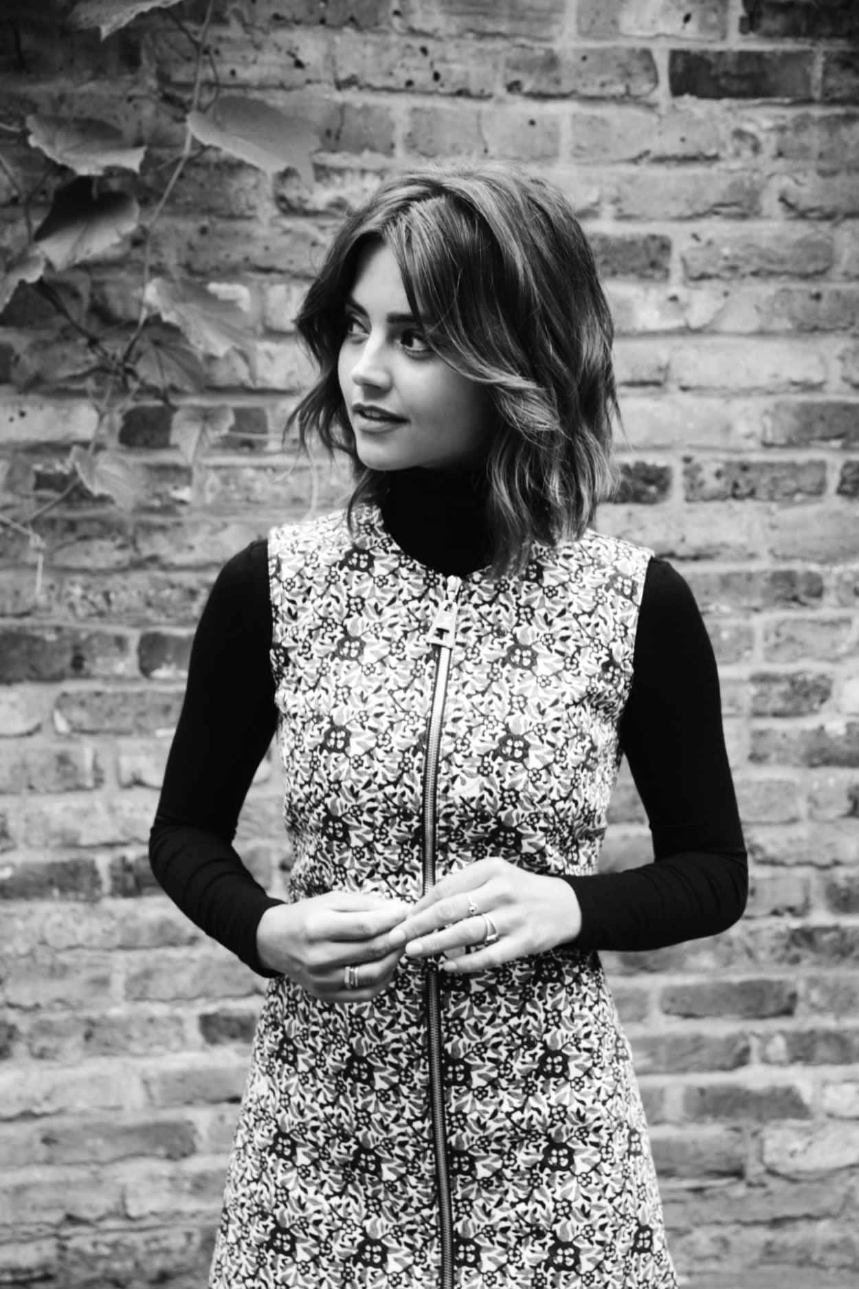 Jenna Coleman Glowing In A Classy Attire Background