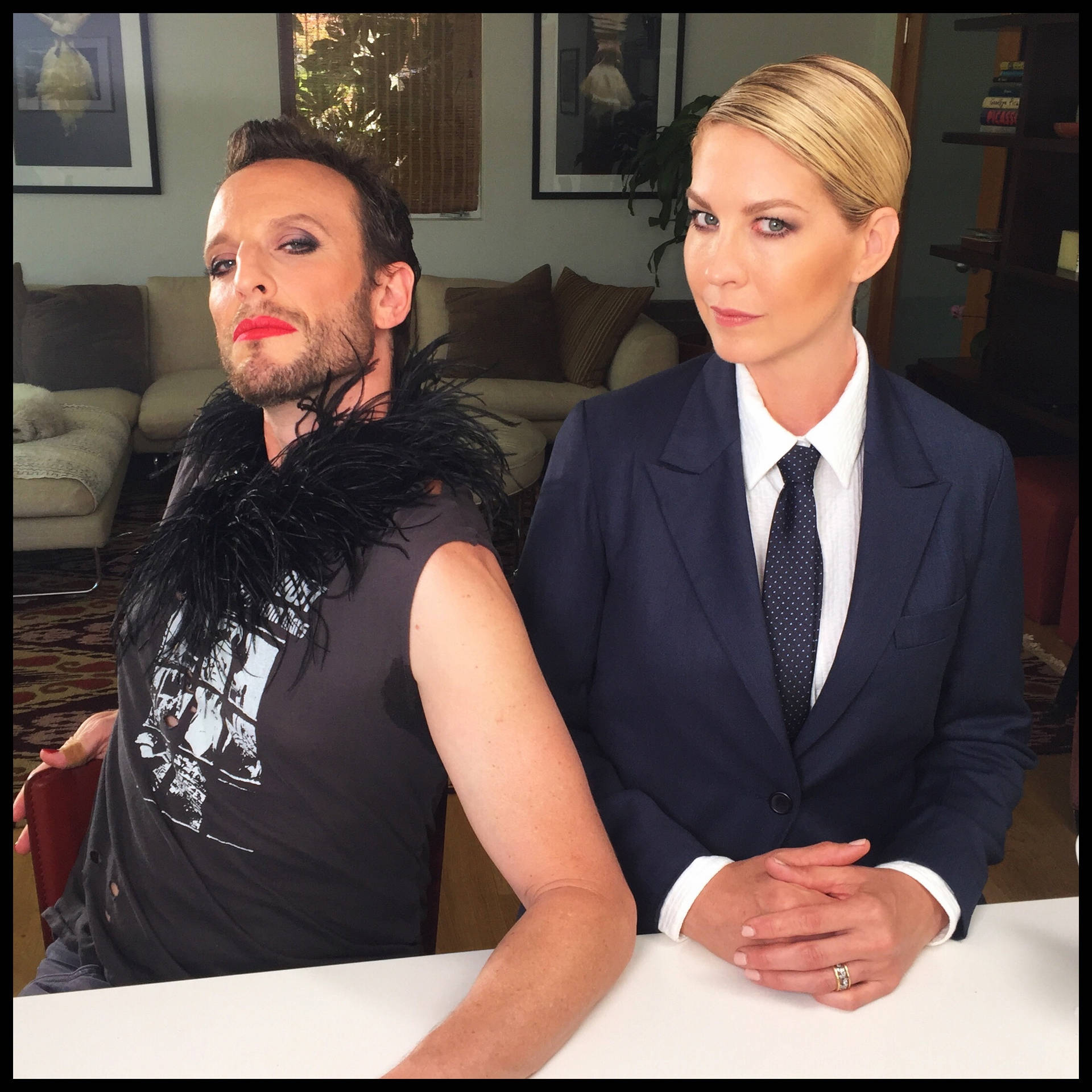 Jenna Elfman And Bodhi Elfman Pulling Off A Fun Gender Swap Pose Background