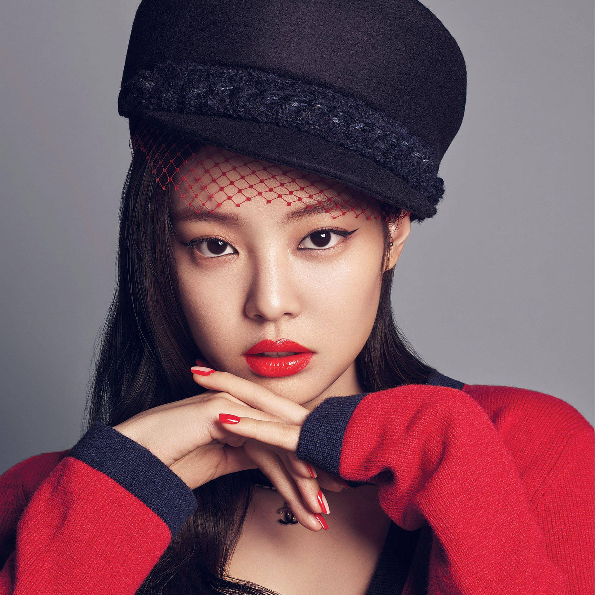 Jennie Wearing Red Coat And Hat Background